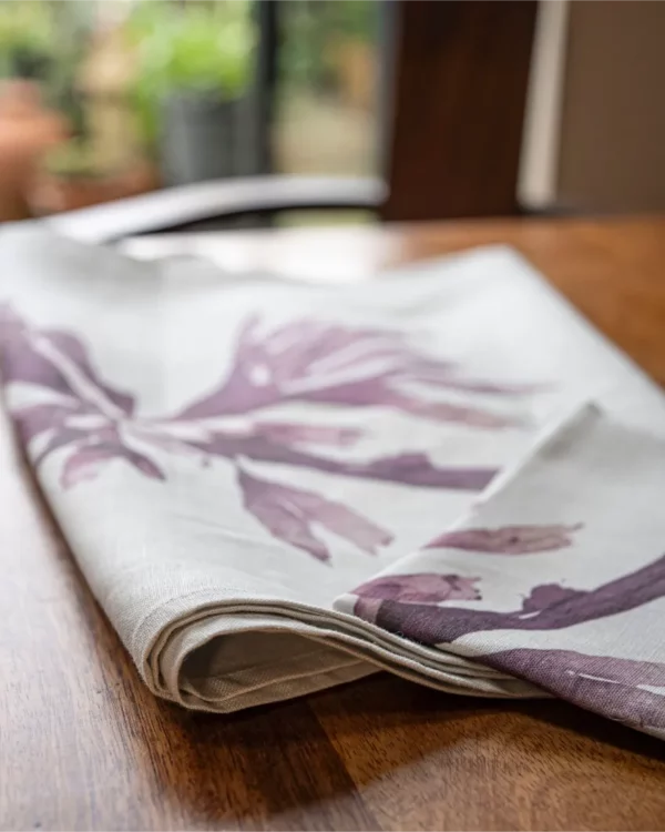 Purple Dulse Napkin by Nicola Weldon - Elegant linen napkin with purple seaweed design