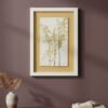 The Rosemary – Original Ceramic Wall Art, inspired by botanical Irish themes, features pressed grasses on yellow ceramic and hangs on a mauve wall above a wooden surface with a small vase of dried sprigs and a textured beige blanket.