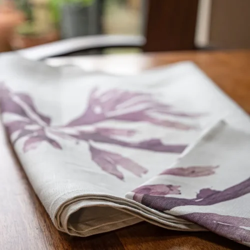 Purple Dulse Napkin by Nicola Weldon - Elegant linen napkin with purple seaweed design