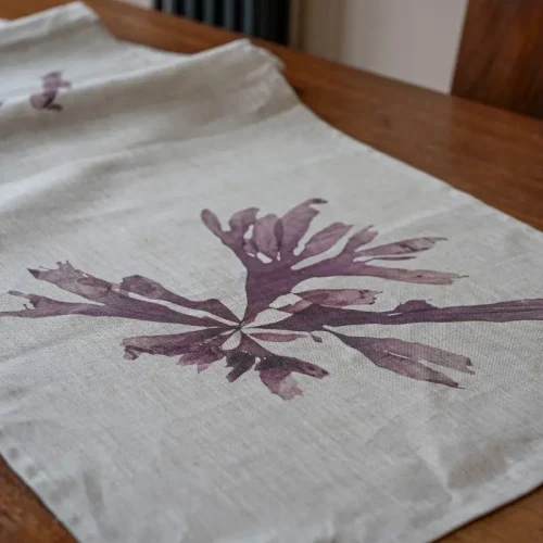 Purple Dulse Linen Tea Towel by Nicola Weldon - Coastal tea towel with purple seaweed designs